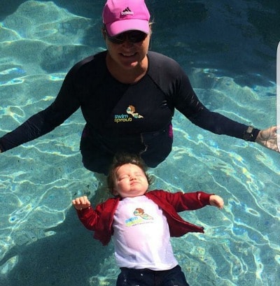 infant safely floating in aquatic surroundings