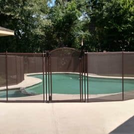nicely installed swim pool and fence